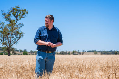 Man standing in field.