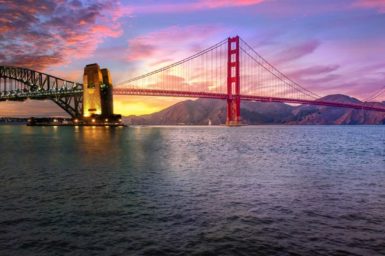 Composite image showing Sydney Harbour bridge joining on to Golden Gate bridge.